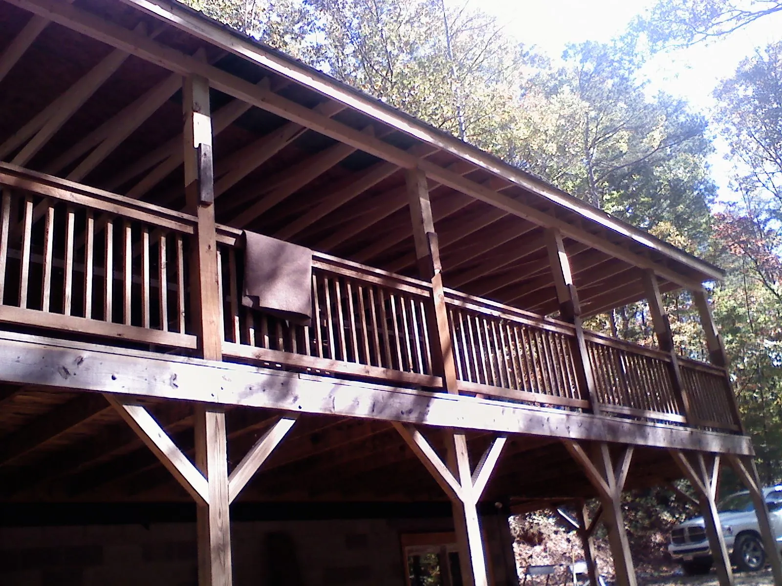 Timber framing under a new elevated porch and deck — Roof Leak Repair in Baraboo by Roofing Brothers